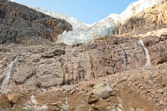 22 Ice Cave Entrance In Cavell Glacier With Angel Glacier Above On Mount Edith Cavell